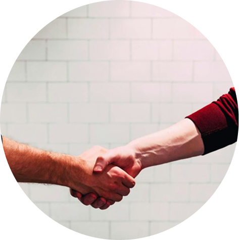 A trusting handshake showing agreement between two parties.