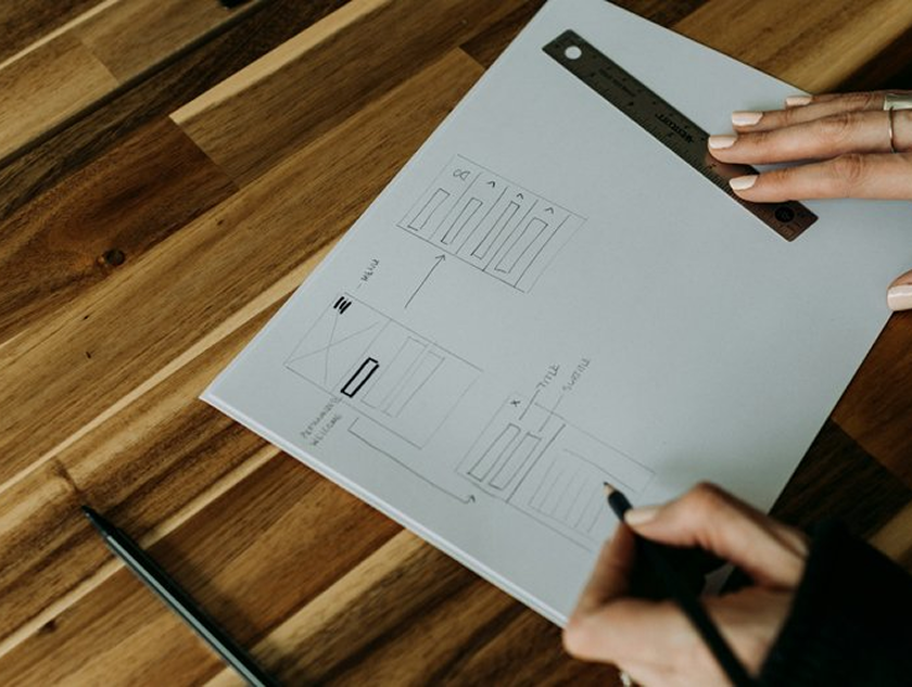 A designer working on a flow chart for a kitchen remodel in Cedar Park, Texas.