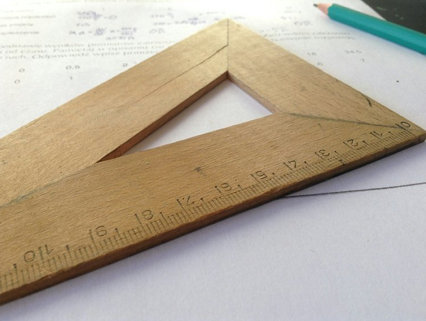 Protractor and pencil on a drafting table in Cedar Park.