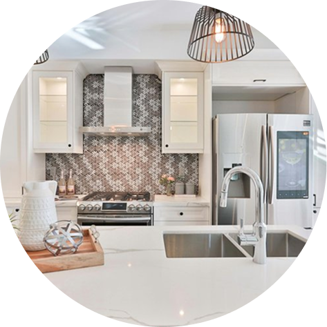 Light colored kitchen remodel in Round Rock, Texas with a darker colored back splash and brushed nickel finishes.