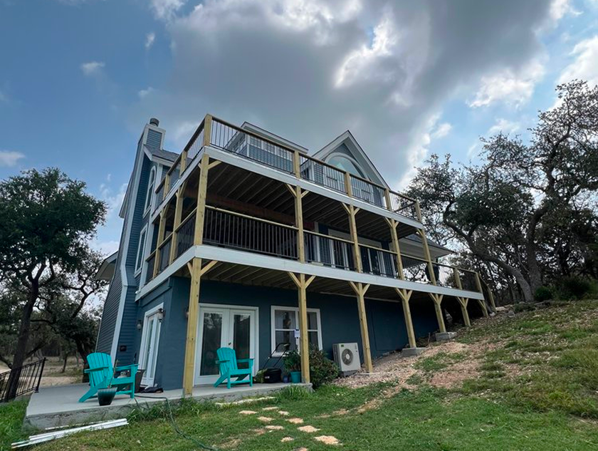 Composite deck and siding and paint job completed in Wimberly, Texas.
