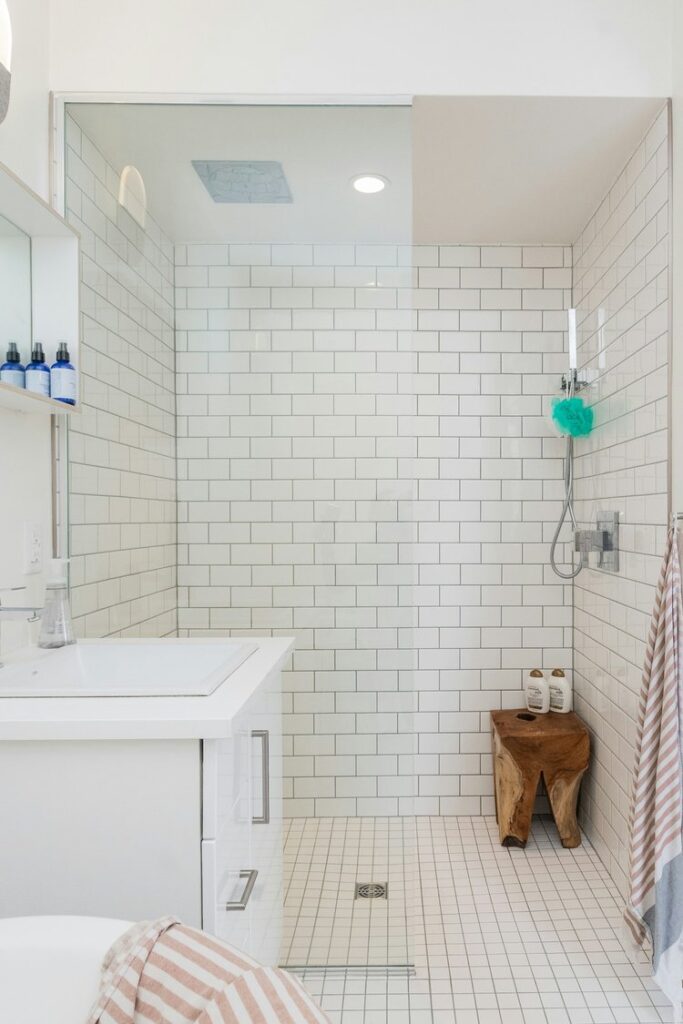 Custom walk in shower with frameless shower glass.