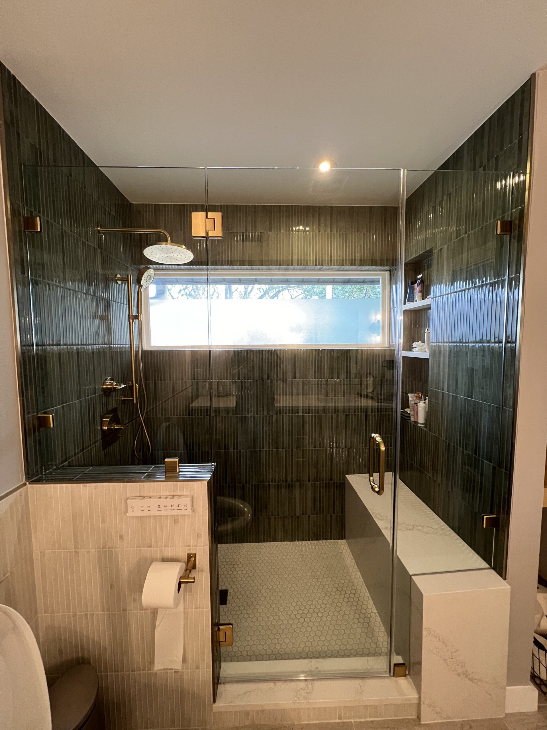 Mid-century modern bathroom in Austin featuring 2026 remodeling trends with floating wooden vanity, geometric tiles, and natural light in a Georgetown home.