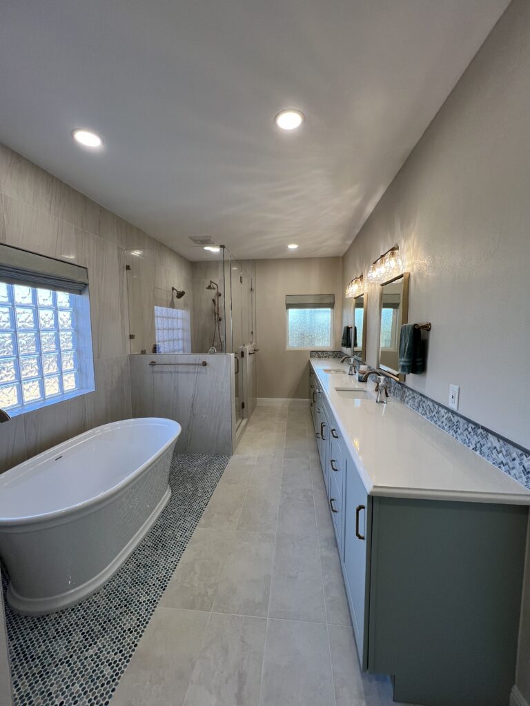Motorized shades in a modern bathroom as part of underrated home remodel ideas